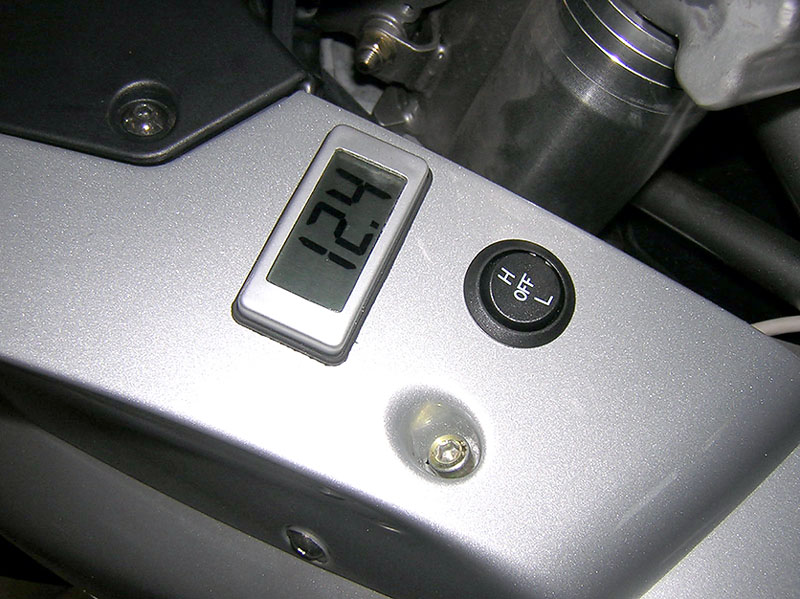 voltmeter and grip heater switch